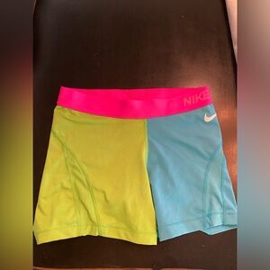 Women’s Nike Pro size medium 3 in inseam multi colored